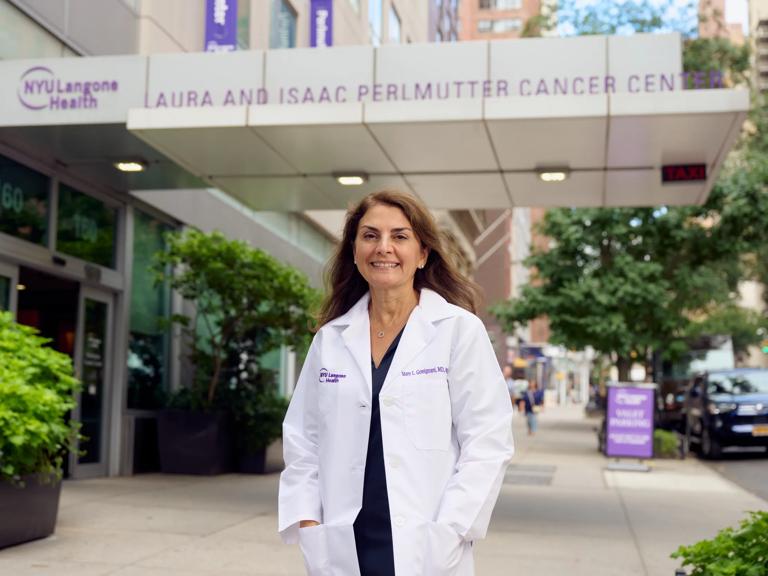 Mary Gemignani, MD, stands outside a Perlmutter Cancer Center location.