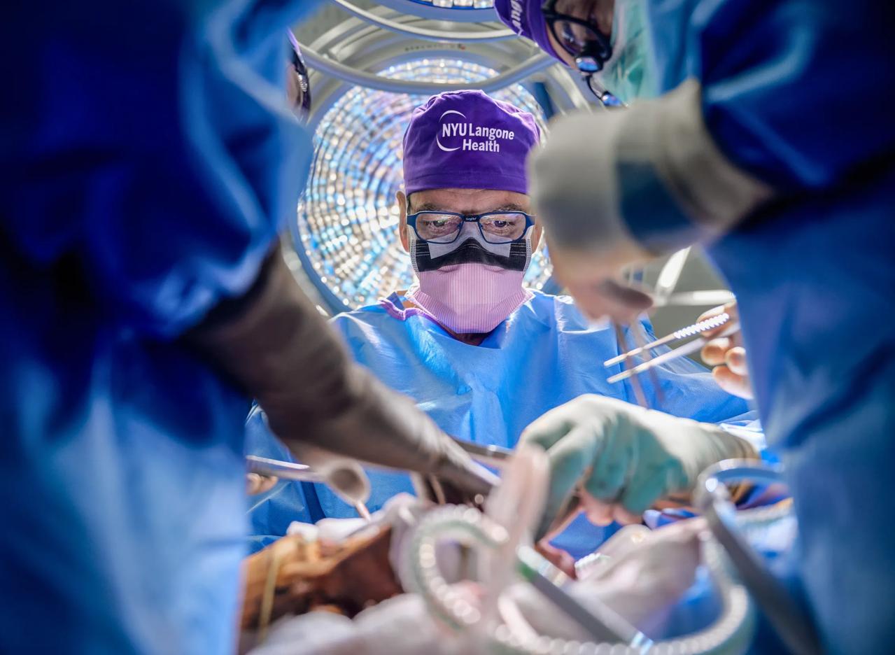 Eduardo Rodriguez, MD, DDS, performs face and whole eye transplant surgery in an operating room at Kimmel Pavilion.