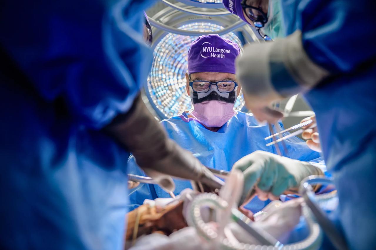 Eduardo Rodriguez, MD, DDS, performs face and whole eye transplant surgery in an operating room at Kimmel Pavilion.