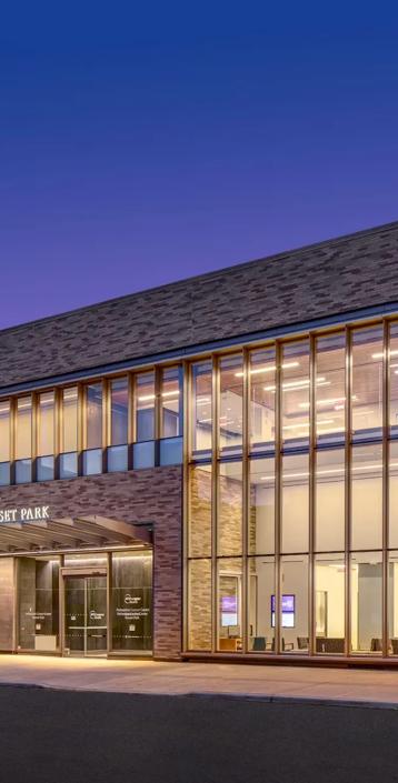 An exterior shot of the entryway of the Perlmutter Cancer Center—Sunset Park building.