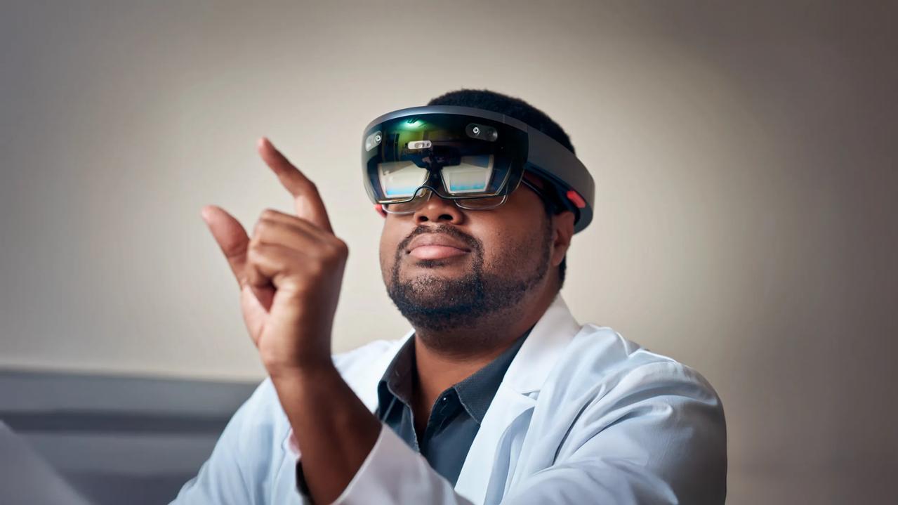 Gregory Dorsainville, Manager of Immersive Computing at the Institute for Innovations in Medical Education wears a VR headset.